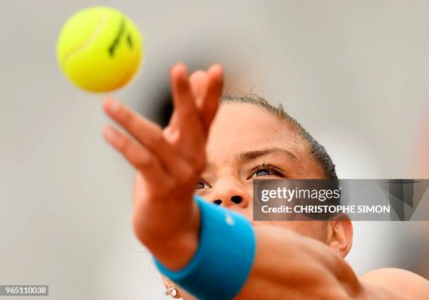 Greece's Maria Sakkari serves to Russia's Daria Kasatkina during their women's singles third round match on day six of The Roland Garros 2018 French...