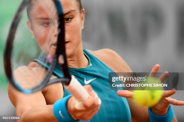 Greece's Maria Sakkari plays a forehand return to Russia's Daria Kasatkina during their women's singles third round match on day six of The Roland...