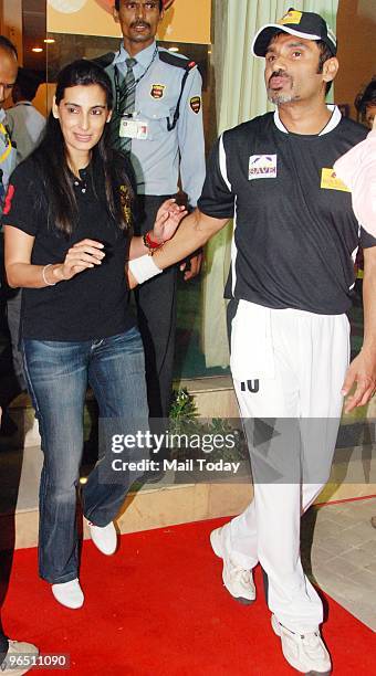 Suneil Shetty with wife Mana during a charity cricket match in Mumbai on February 5, 2010.