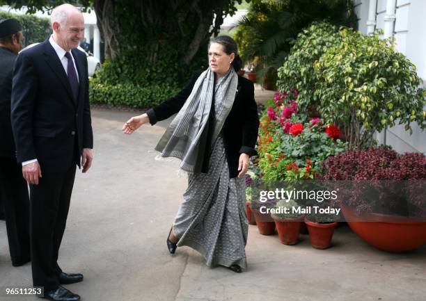 Greek Prime Minister George Papandreou meets Congress President Sonia Gandhi at her residence in New Delhi on February 5, 2010.