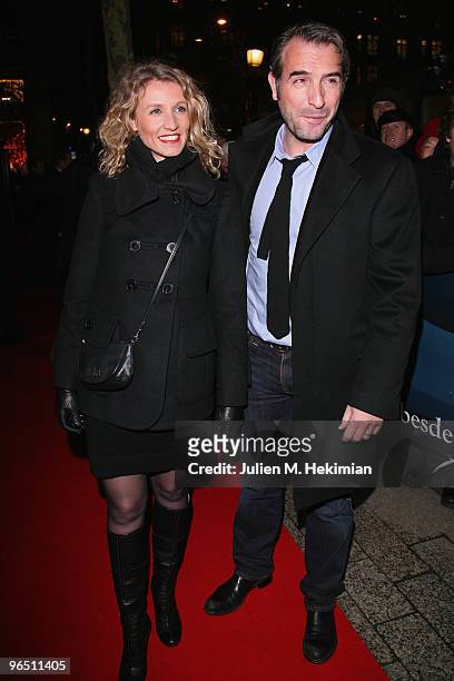 Jean Dujardin and Alexandra Lamy attend the Globe de Cristal ceremony at Le Lido on February 8, 2010 in Paris, France.