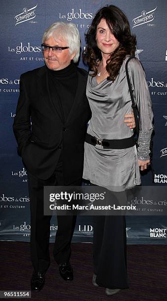 Marc Cerrone and his wife Jill poses at the Ceremony of Globe de Cristal 2010 Awards at Le Lido on February 8, 2010 in Paris, France.