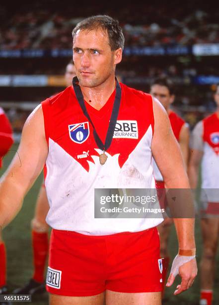 Tony Lockett of the Swans is presented with the Coleman Medal, as the highest goal scorer in the season, during the AFL 2nd Qualifying Final match...