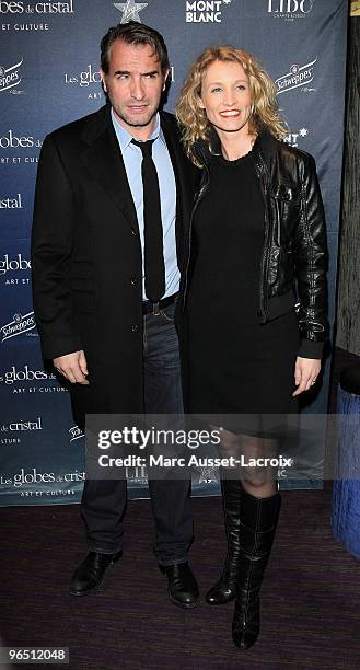 Jean Dujardin and Alexandra Lamy poses at the Ceremony of Globe de Cristal 2010 Awards at Le Lido on February 8, 2010 in Paris, France.