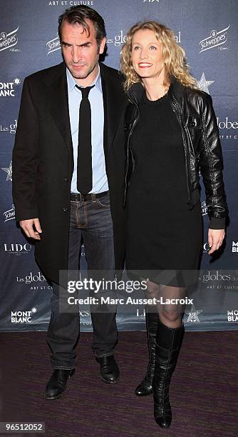 Jean Dujardin and Alexandra Lamy poses at the Ceremony of Globe de Cristal 2010 Awards at Le Lido on February 8, 2010 in Paris, France.