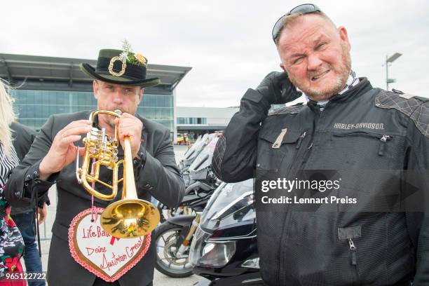 Life Ball organizer Gerald 'Gery' Keszler and amfAR CEO Kevin Robert Frost pose during the arrival of the Life Ball plane on June 1, 2018 in...