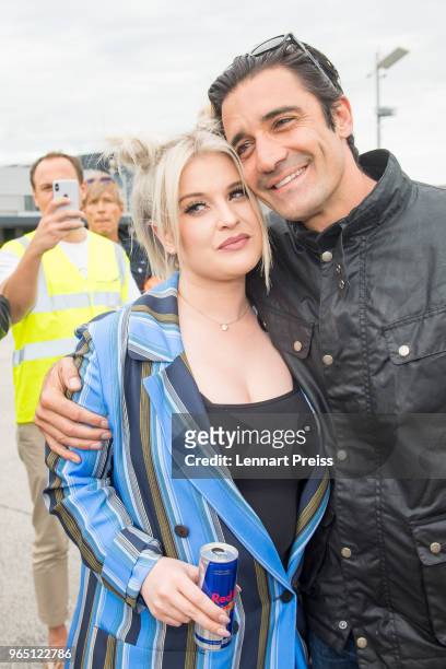 Kelly Osbourne and Gilles Marini pose during the arrival of the Life Ball plane on June 1, 2018 in Salzburg, Austria. The EpicRiders travel from...
