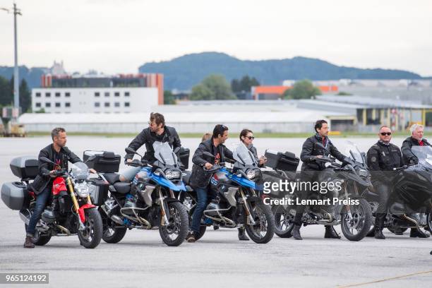 EpicRiders JR Bourne , Michiel Huisman, Gilles Marini, Adrien Brody, amfAR CEO Kevin Robert Frost and Dick Huisman stop their bikes on the apron...