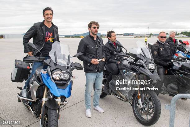 EpicRiders Gilles Marini , Michiel Huisman, Adrien Brody, amfAR CEO Kevin Robert Frost and Dick Huisman wait on the apron before the arrival of the...