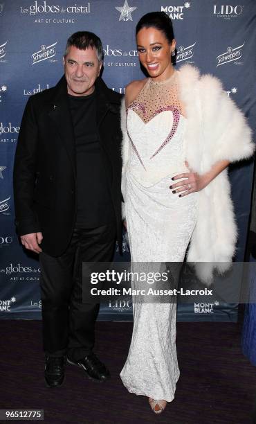 Jean-Marie Bigard and Guest poses at the Ceremony of Globes de Cristal 2010 Awards at Le Lido on February 8, 2010 in Paris, France.