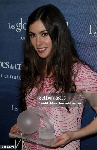 Olivia Ruiz poses with her Globe de Cristal after being awarded at Le Lido on February 8, 2010 in Paris, France.