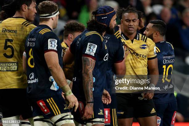 An altercation breaks out between players during the round 16 Super Rugby match between the Highlanders and the Hurricanes at Forsyth Barr Stadium on...
