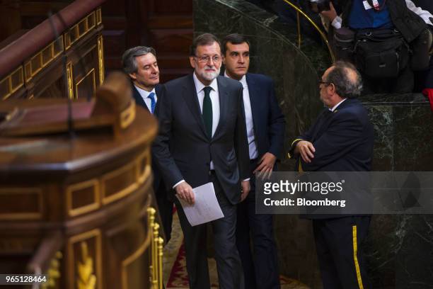 Mariano Rajoy, president of Spain, center, arrives at congress ahead of a no-confidence motion vote at parliament in Madrid, Spain, on Friday, June...