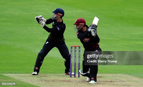 Peter Trego of Somerset bats as Gareth Roderick of Gloucestershire looks on during the Royal London One-Day Cup match between Somerset and...