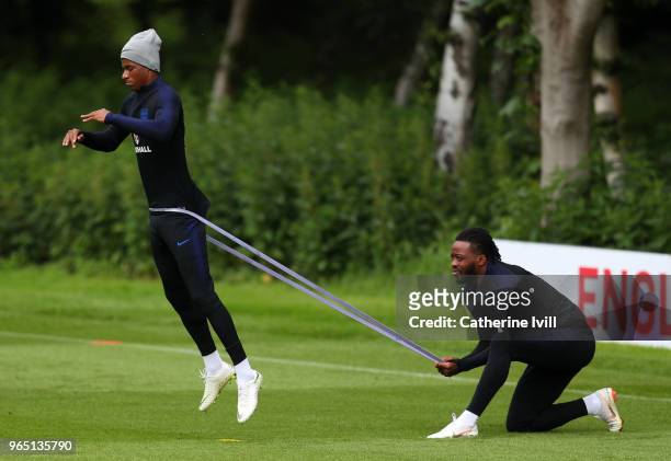 Marcus Rashford and Nathaniel Chalobah take part during the England training session at The Grove Hotel on June 1, 2018 in Hertford, England.