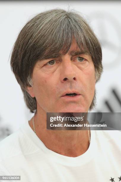 Joachim Loew, head coach of the German national team talks to the media during a press conference of the German national team at Sportanlage Rungg on...