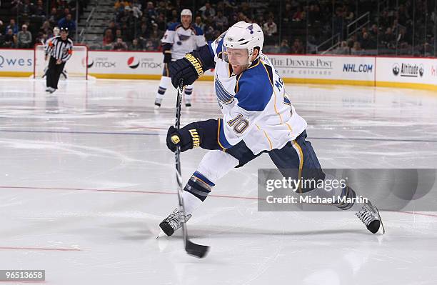 Andy McDonald of the St. Louis Blues shoots against the Colorado Avalanche at the Pepsi Center on February 08, 2010 in Denver, Colorado.