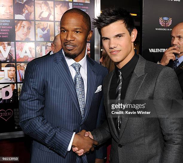 Actors Jamie Foxx and Taylor Lautner arrive at the premiere of New Line Cinema's "Valentine's Day" held at Grauman's Chinese Theatre on February 8,...