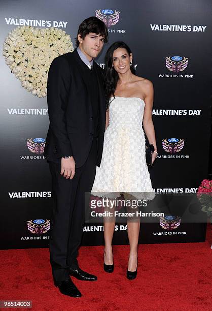 Actor Ashton Kutcher and wife actress Demi Moore arrive at the premiere of New Line Cinema's "Valentine's Day" held at Grauman�s Chinese Theatre on...