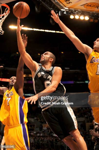 Tony Parker of the San Antonio Spurs puts up a shot against Lamar Odom and Jordan Farmar of the Los Angeles Lakers at Staples Center on February 8,...