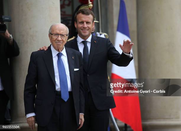 French President Emmanuel Macron and Tunisia's President Beji Caid Essebsi prior to an international conference on Libya at the Elysee Presidential...