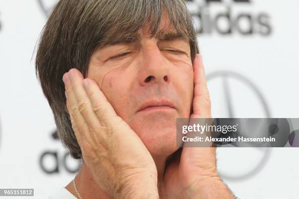 Joachim Loew, head coach of the German national team reacts during a press conference of the German national team at Sportanlage Rungg on day ten of...