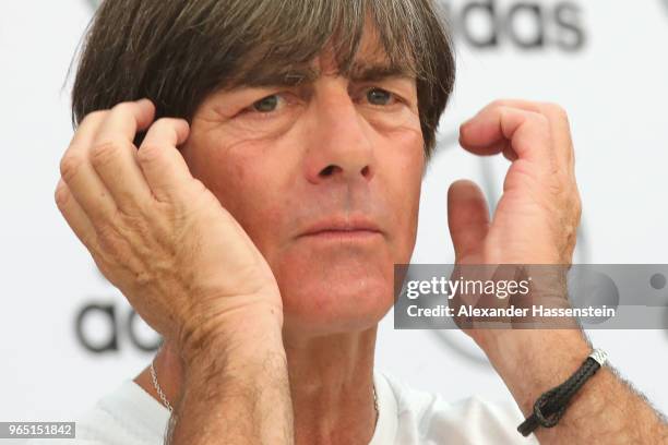 Joachim Loew, head coach of the German national team reacts during a press conference of the German national team at Sportanlage Rungg on day ten of...