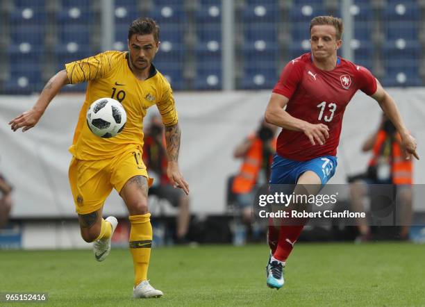 Josh Risdon of Australia is chased by Jan Kopic of the Czech Republic during the International Friendly match between the Czech Republic and...