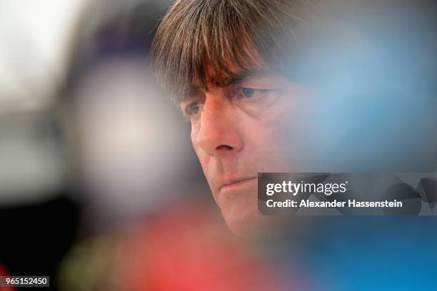 Joachim Loew, head coach of the German national team talks to the media during a press conference of the German national team at Sportanlage Rungg on...