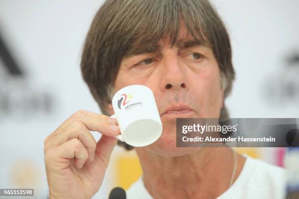 Joachim Loew, head coach of the German national team enjoys an Espresso during a press conference of the German national team at Sportanlage Rungg on...