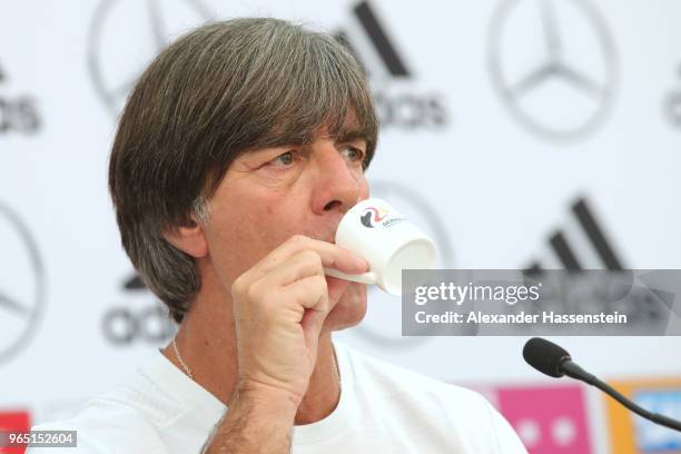 Joachim Loew, head coach of the German national team enjoys an Espresso during a press conference of the German national team at Sportanlage Rungg on...