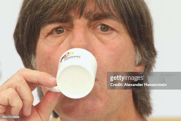 Joachim Loew, head coach of the German national team enjoys an Espresso during a press conference of the German national team at Sportanlage Rungg on...
