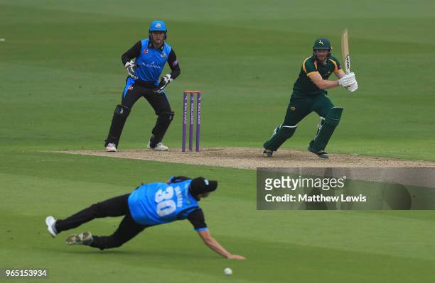 Riki Wessels of Nottinghamshire hist the ball past Ed Barnard of Worcestershire during the Royal London One-Day Cup match between Nottinghamshire nad...