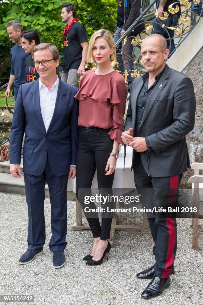 Thaddaeus Ropac, Charlize Theron and Life Ball organizer Gerald 'Gery' Keszler attend the Thaddaeus Ropac's brunch during the amfAR EpicRide to Life...
