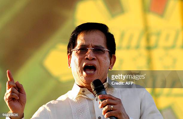 Philippine religious leader and presidential candidate Eddie Villanueva gestures as he delivers his opening campaign speech to a crowd of supporters...