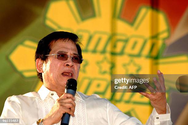 Philippine religious leader and presidential candidate Eddie Villanueva gestures as he delivers his opening campaign speech to a crowd of supporters...