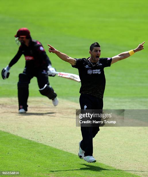 Benny Howell of Gloucestershire celebrates the wicket of Peter Trego of Somerset during the Royal London One-Day Cup match between Somerset and...