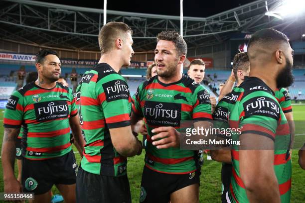 Sam Burgess of the Rabbitohs celebrates victory with team mates at the end of the round 13 NRL match between the South Sydney Rabbitohs and the...
