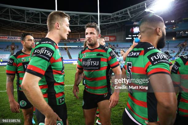 Sam Burgess of the Rabbitohs celebrates victory with team mates at the end of the round 13 NRL match between the South Sydney Rabbitohs and the...