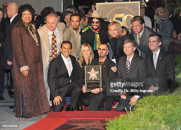 Barbara Bach and her husband, musician Ringo Starr pose as he is honored with a Star on the Hollywood Walk of Fame on February 8, 2010 in Hollywood,...