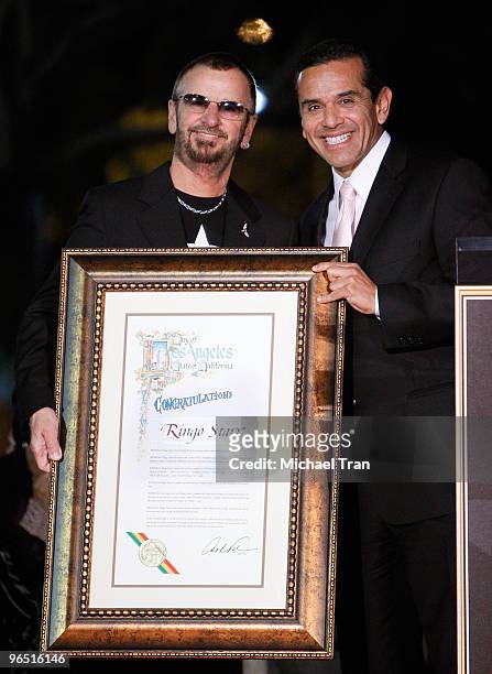 Musician Ringo Starr and Los Angeles Mayor Antonio Villaraigosa attend the 50th Anniversary Celebration by honoring musician Ringo Starr with a Star...