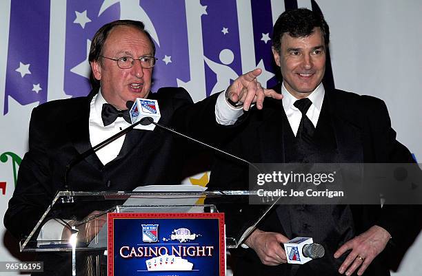 Auctioneer and MSG broadcaster Sam Rosen with MSG hockey analyst Joe Micheletti during casino night to benefit the Garden Of Dreams Foundation at...