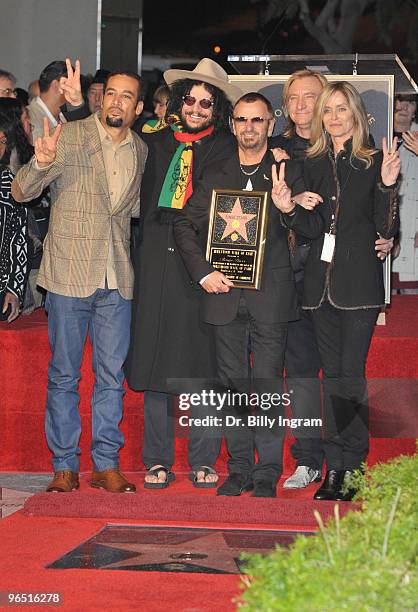 Musician Ben Harper, Don Wood, Ringo Starr, Joe Walsh and Barbara Bach pose as Ringo Starr is honored with a Star on the Hollywood Walk of Fame on...