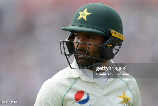 Asad Shafiq of Pakistan leaves the field after being dismissed during the 2nd Natwest Test match between England and Pakistan at Headingley cricket...