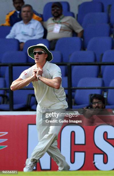 Morne Morkel of South Africa takes the catch to dismiss Murali Vijay of India for 32 runs during day four of the First Test match between India and...