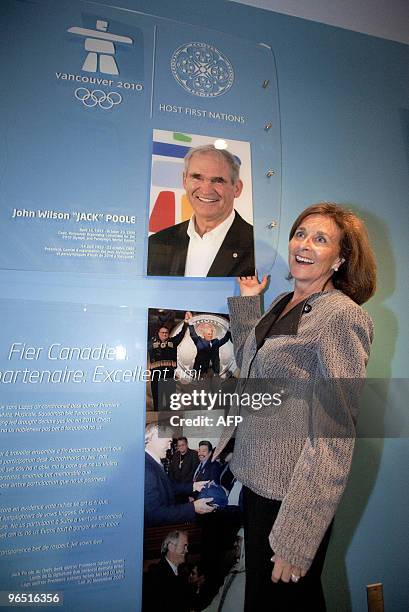 Darlene Poole, widow of the late Jack Poole is posing in front of the memorial wall in memory of her husband at the official opening ceremony of 2010...