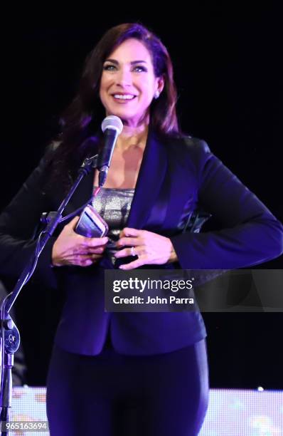 Carmen Dominicci receives award at Premios Estrellas Digitales 2018 at James L. Knight Center on May 31, 2018 in Miami, Florida.