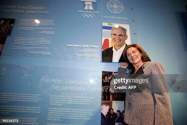 Darlene Poole, widow of the late Jack Poole is posing in front of the memorial wall in memory of her husband at the official opening ceremony of 2010...