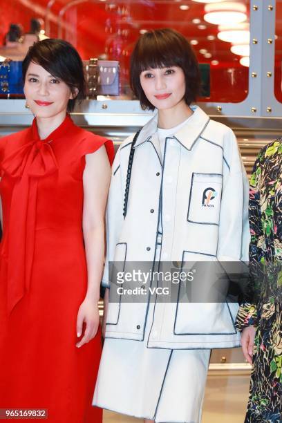 Actress Faye Yu and actress Yuan Quan attend the opening ceremony of Prada store at the Beijing SKP on May 31, 2018 in Xi'an, Shaanxi Province of...
