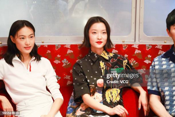 Model Qin Shupei and model and actress Du Juan attend the opening ceremony of Prada store at the Beijing SKP on May 31, 2018 in Xi'an, Shaanxi...